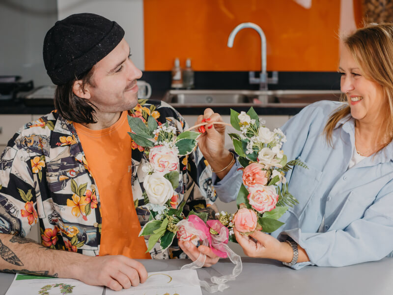 Mother and son flower arranging